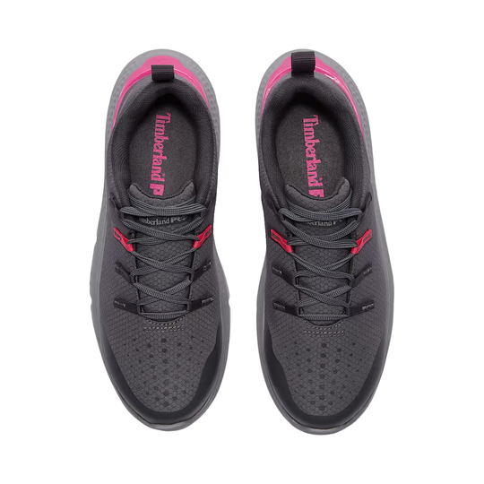 Gray sneakers with pink accents on a white background