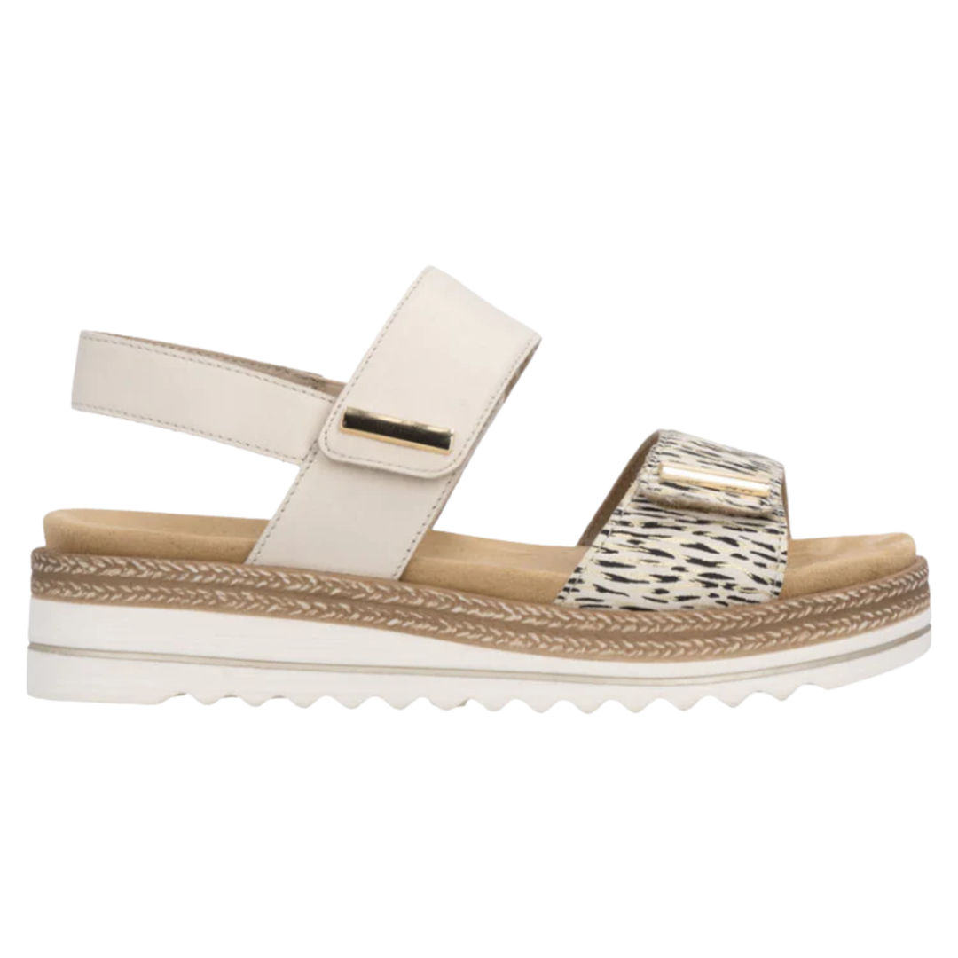 Beige sandal with a platform sole on a white background