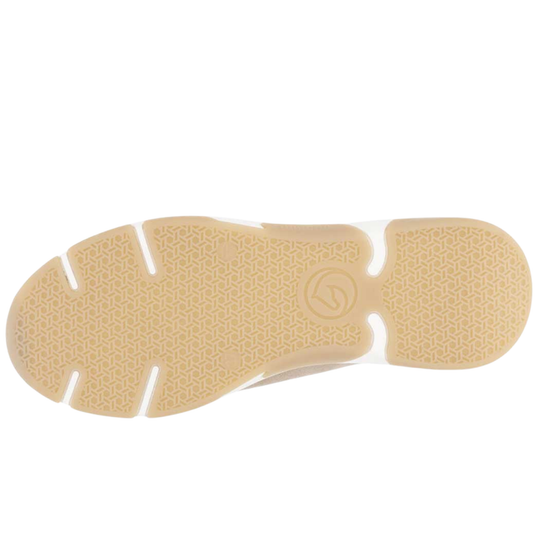 Close-up of a beige shoe sole with a white sole on a white background
