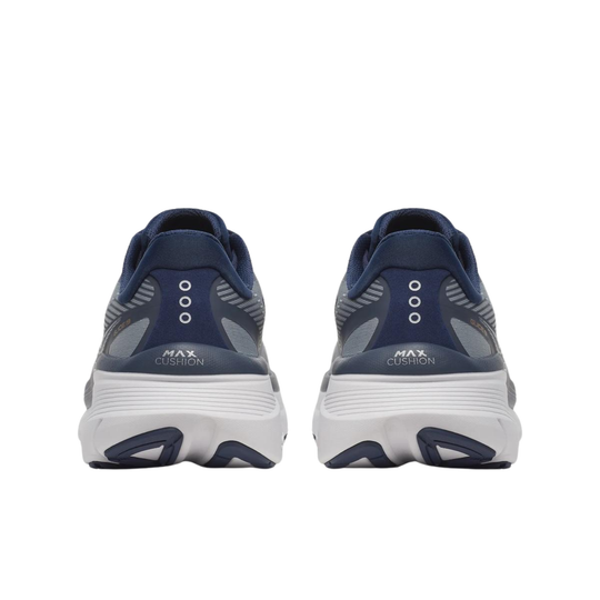 Pair of navy running shoes with white soles on a white background