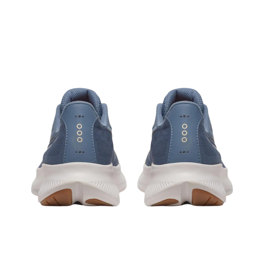 Blue running shoes with white soles on a white background