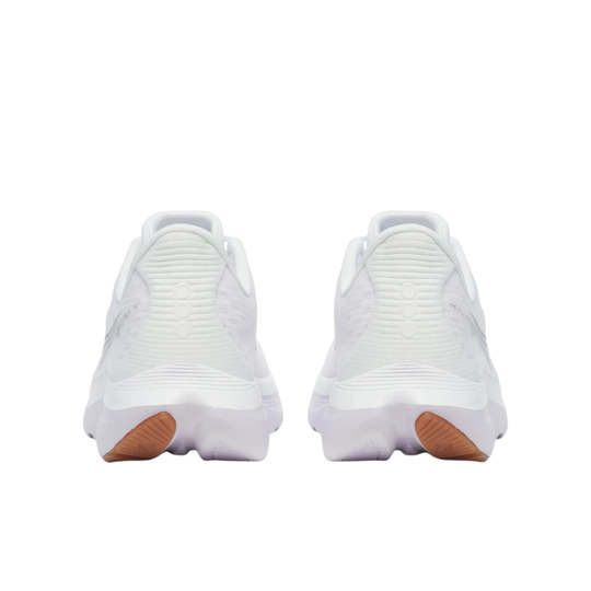 White athletic shoes with brown soles on a white background