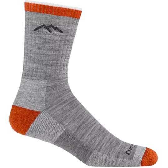 Gray sock with orange accents and mountain logo on a white background