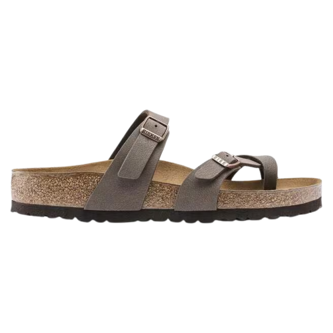 Brown sandal with cork sole on a white background