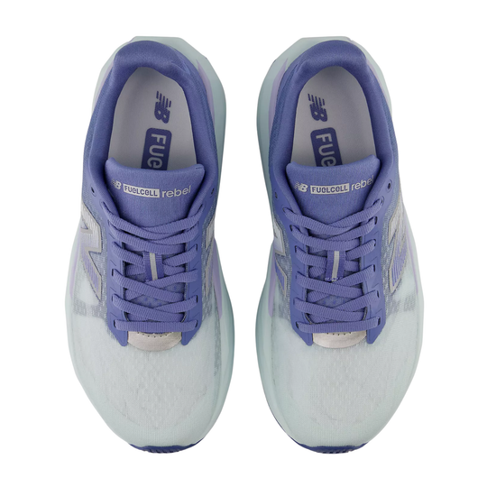 Pair of purple and white running shoes on a white background