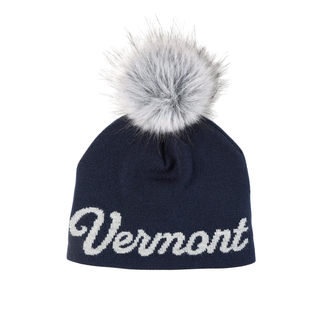 Navy blue beanie with 'Vermont' text and gray fur pom-pom on a white background