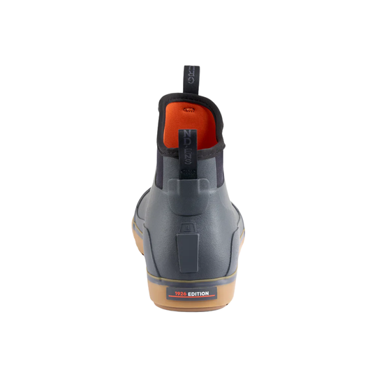 Gray ankle boot with orange interior on a white background