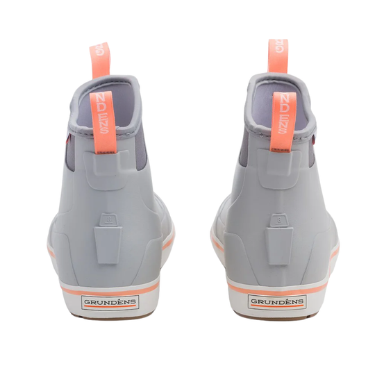 Gray rubber boots with orange accents and 'Grundéns' branding on a white background