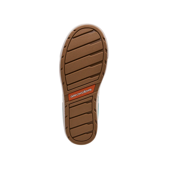 Brown sole of a shoe with 'Grundéns' branding on a white background