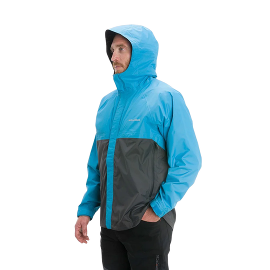 Person wearing a blue and gray raincoat on a white background