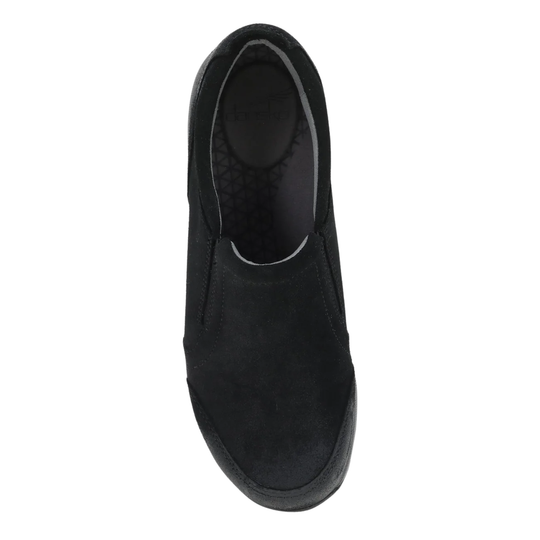 Black slip-on shoe on a white background