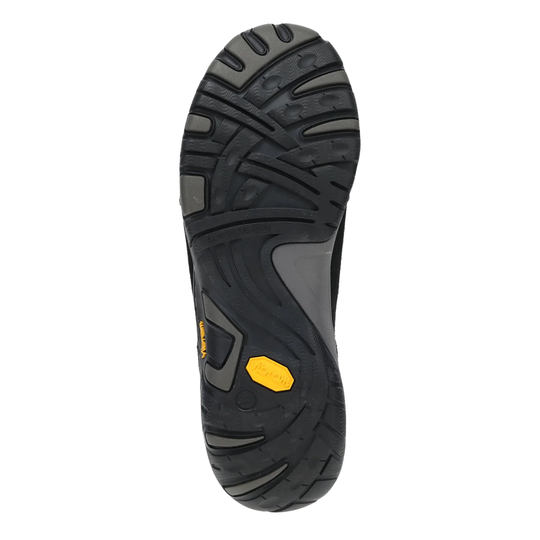 Black and gray sole of a shoe with a yellow heel tab on a white background