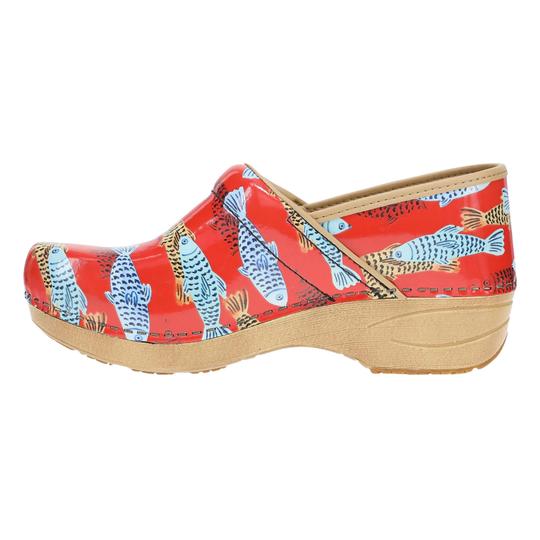 Clog shoe with fish pattern on a red background