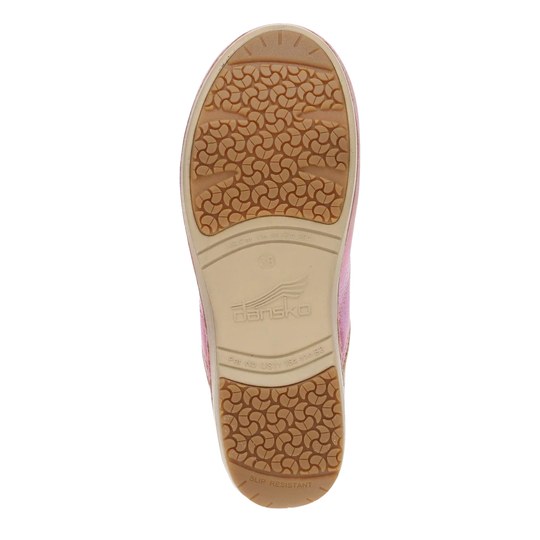 Close-up of a shoe sole with a brand logo on a white background