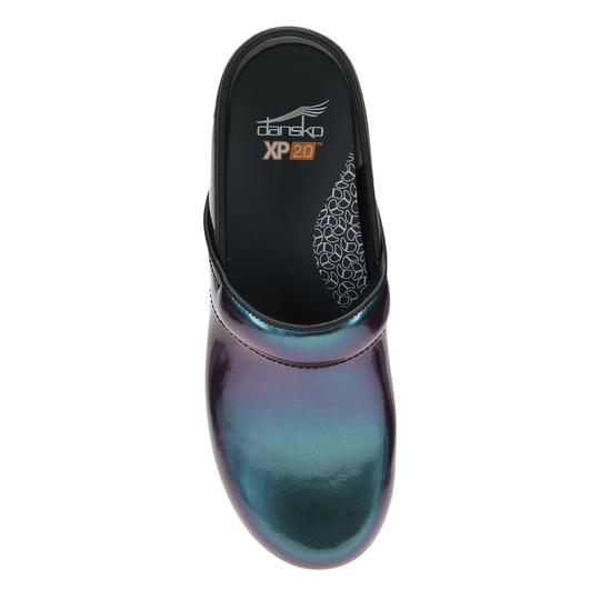 Iridescent clog shoe with 'Dansko' branding on a white background