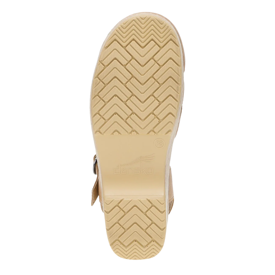 Beige shoe sole with tread pattern on a white background