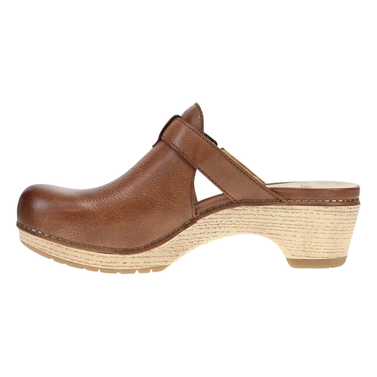 Brown wooden clog shoe on a white background