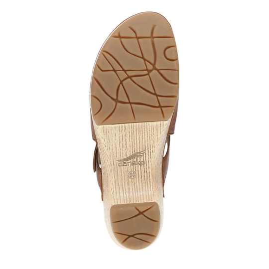 Brown sandal sole with visible brand logo on a white background