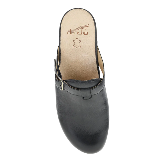 Black leather clog shoe with a strap on a white background