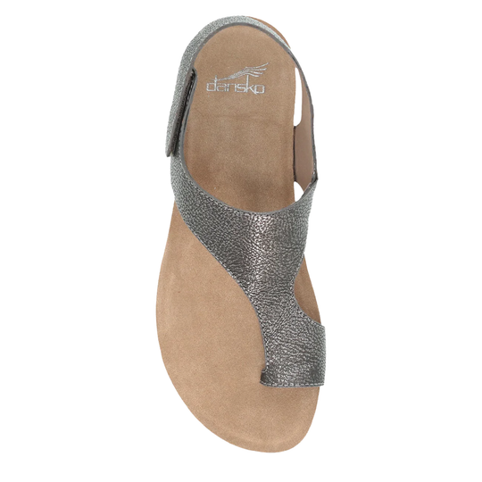 Silver sandal with tan sole on a white background