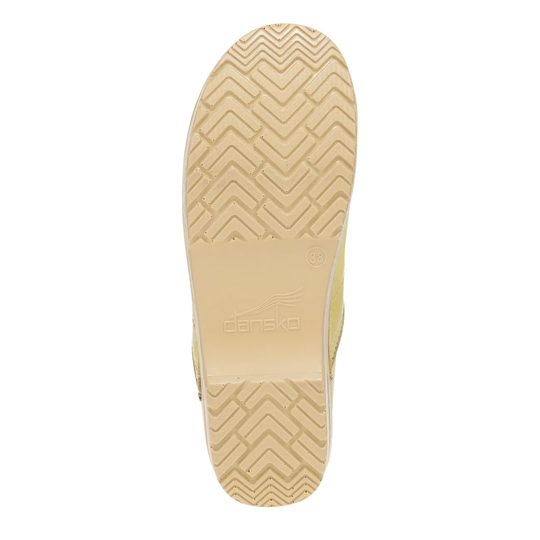 Beige shoe sole with tread pattern on a white background