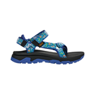 Blue sandal with colorful strap design on a white background