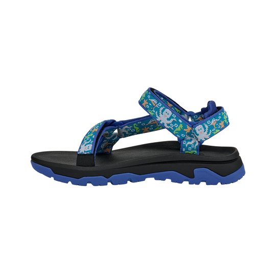 Blue and black sandal with floral strap design on a white background