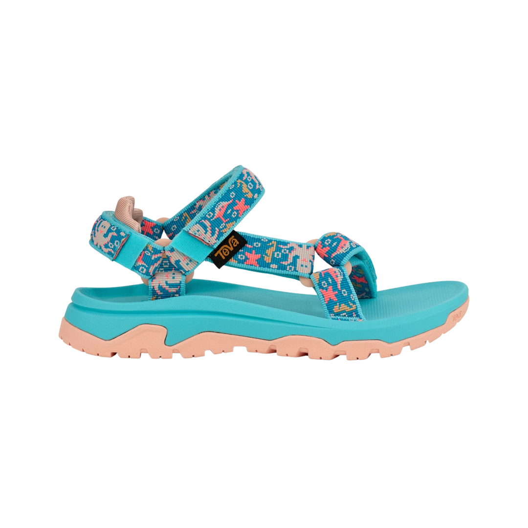 Blue sandal with pink sole on a white background