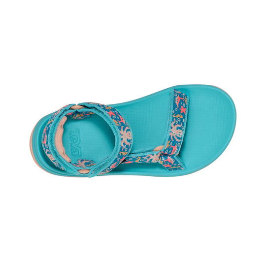 Turquoise sandal with floral strap on a white background