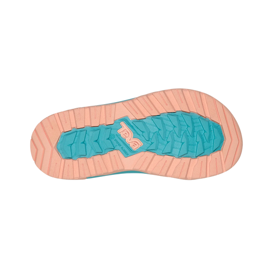 Top view of a sandal with a pink sole and blue insole on a white background