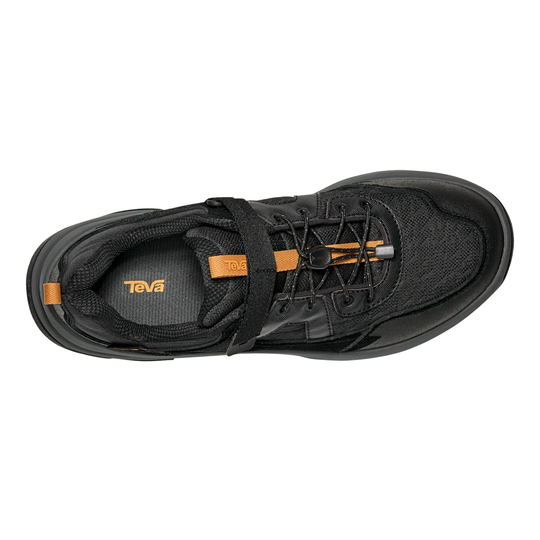 Black sneaker with orange accents on a white background