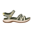 Green sandal with brown sole on a white background