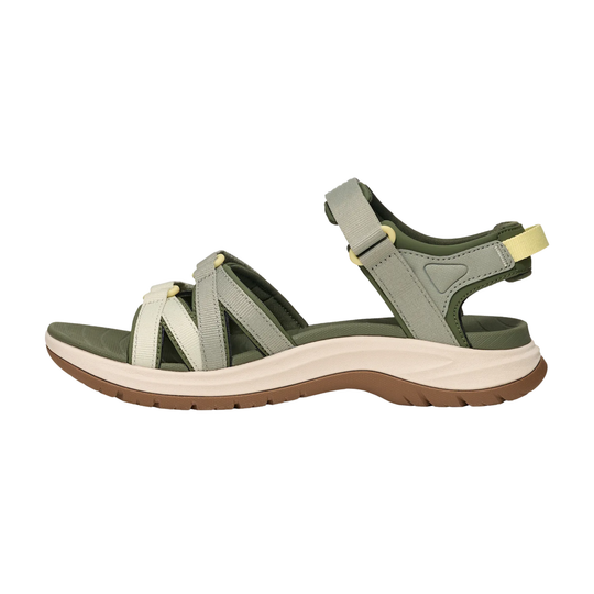 Green sandal with a white sole on a white background