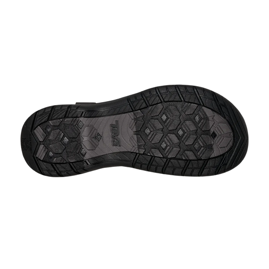 Black rugged outsole with textured tread and visible Teva logo