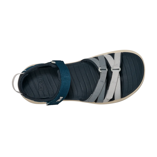 Navy sandal with white straps on a white background