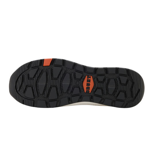 Black and orange sole of a shoe on a white background
