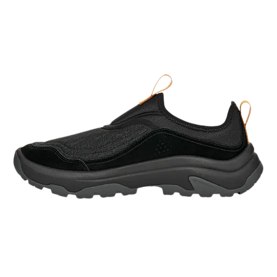 Black sneaker on a light gray background