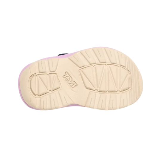 Close-up of a shoe sole with brand logo on a white background