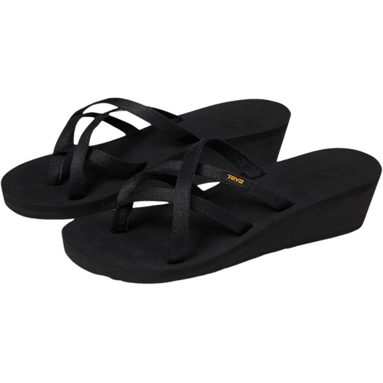Black wedge sandals on a white background