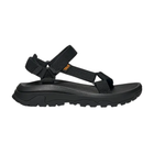 Black sandal with multiple straps on a white background