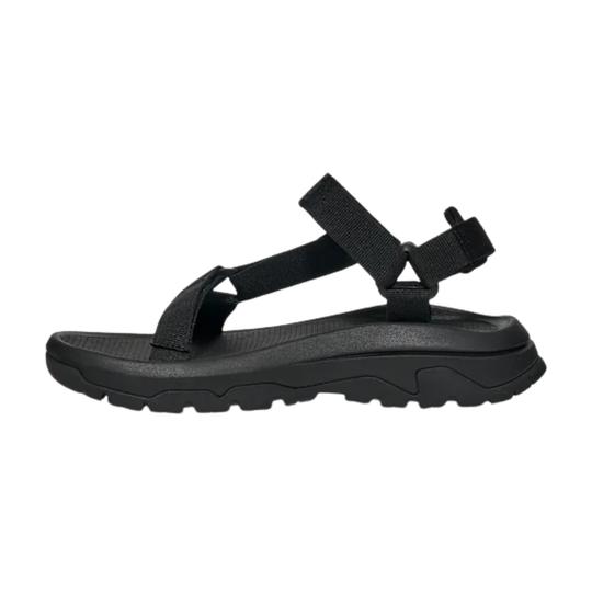 Black sandal with multiple straps on a white background
