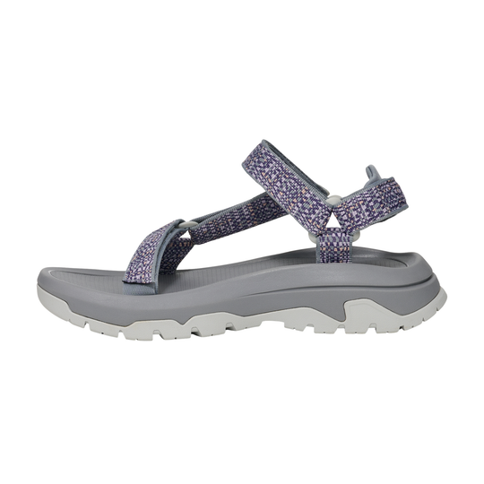 Gray sandal with purple straps on a white background