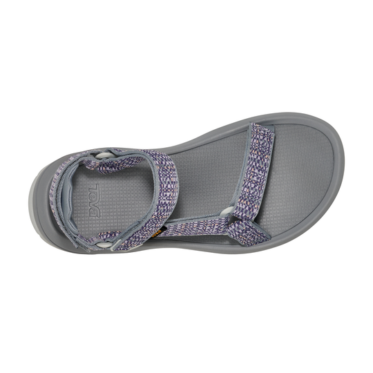 Gray sandal with purple straps on a white background
