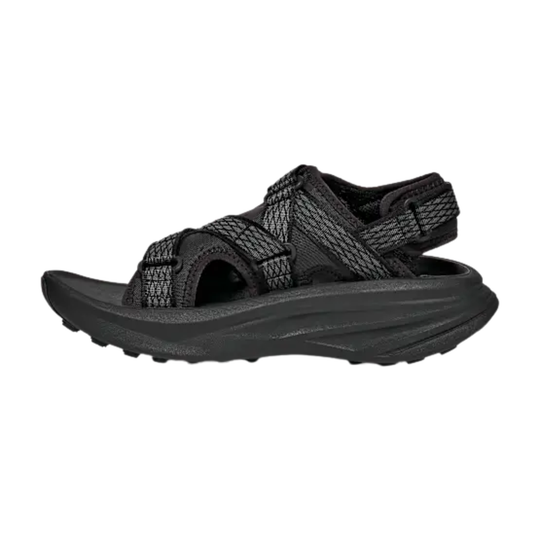 Black sandal with adjustable straps on a white background