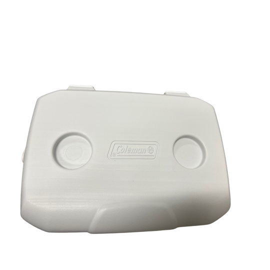 White Coleman cooler lid on a white background