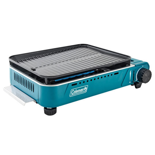 Blue Coleman portable grill on a white background