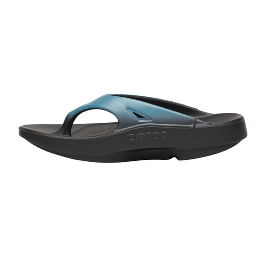 Black sandal with a white sole on a white background