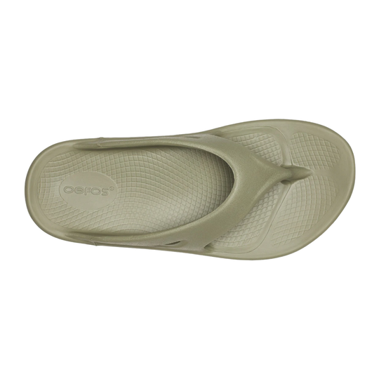Green sandal with 'Geox' branding on a white background