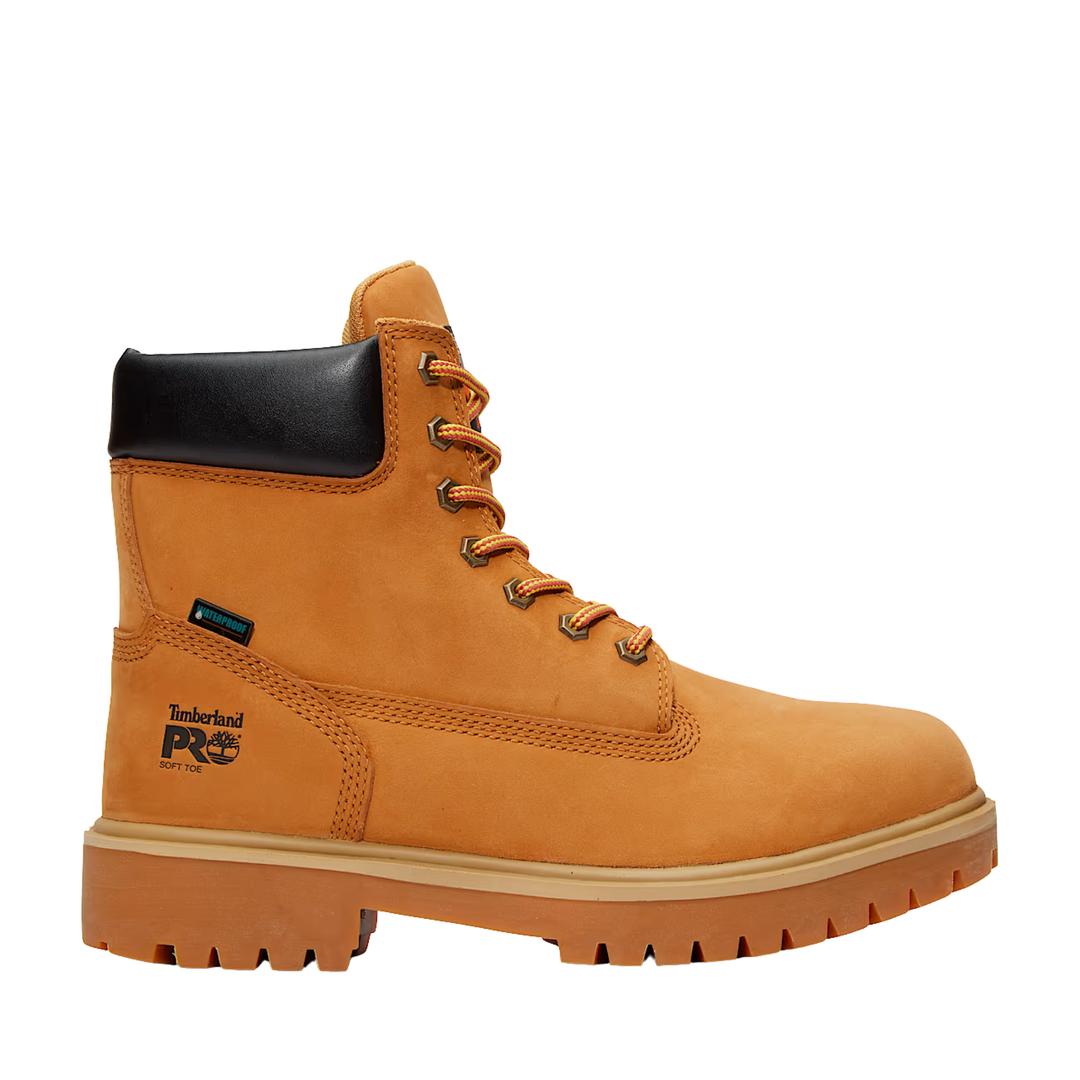 Tan work boot with black top on a white background