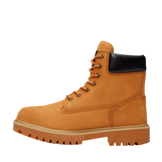 Tan boot with black heel tab on a white background